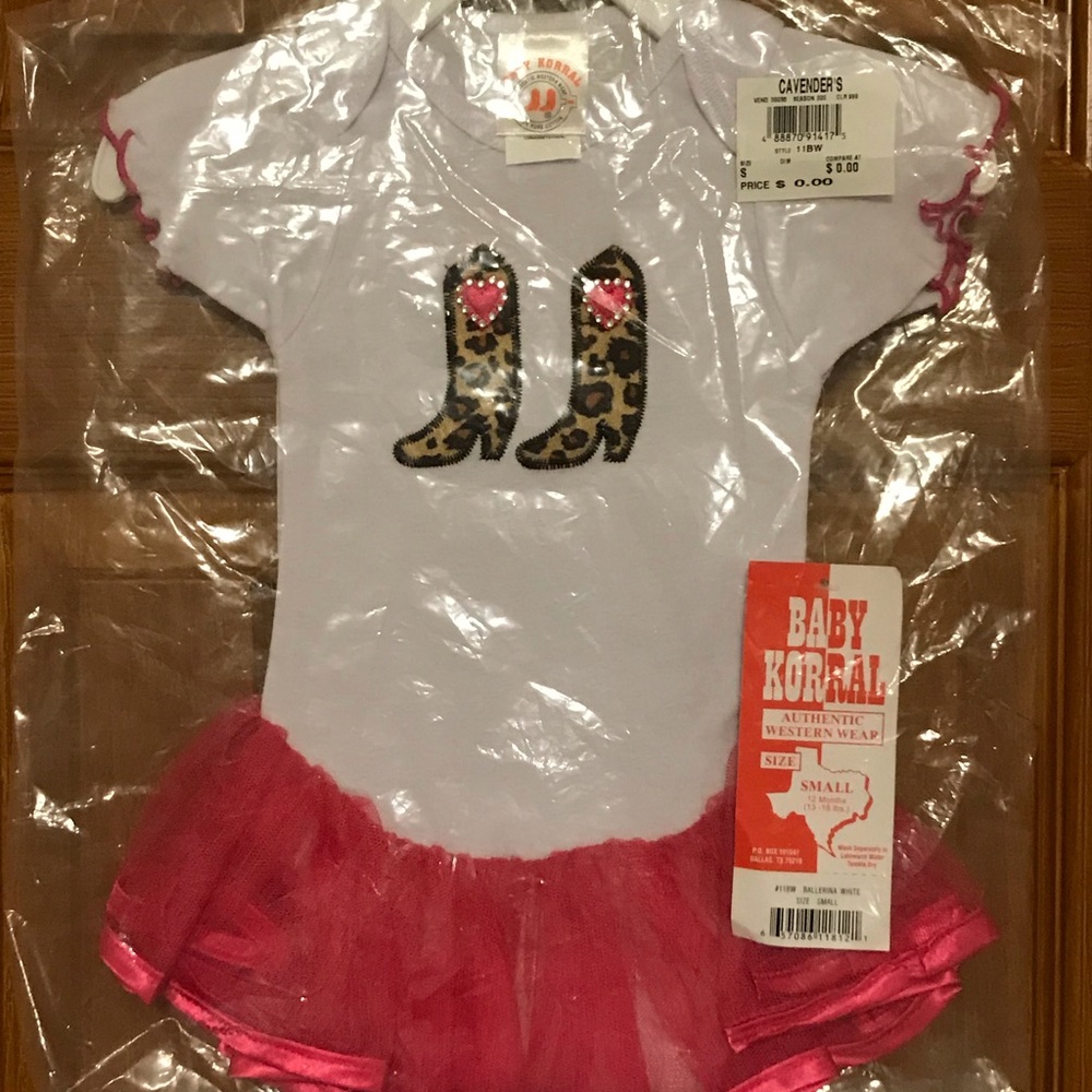 Western onesie with attached pink tutu.